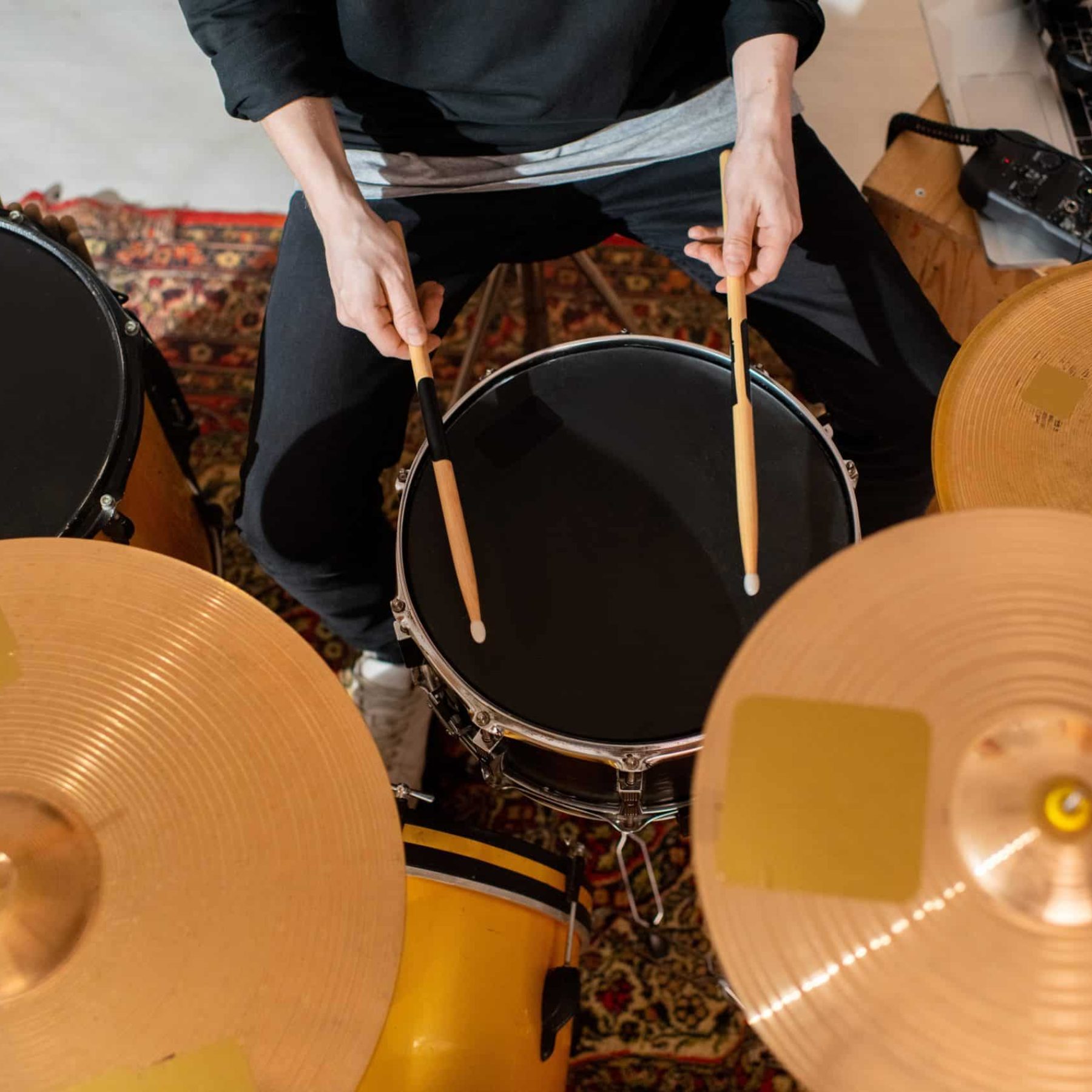 overview-of-hands-of-young-drummer-or-musician-wit-2023-11-27-05-29-33-utc-min
